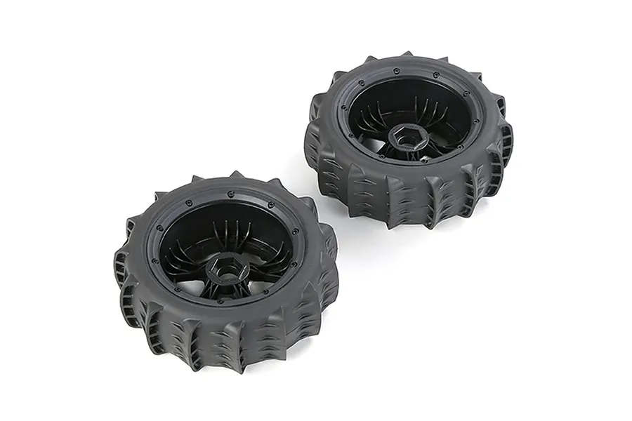 Two Rovan 1/5 scale black paddle tyres mounted on black beadlock rims, viewed from an angle against a white background.