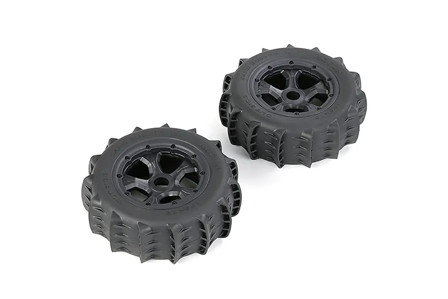 Two Rovan 1/5 scale black paddle tyres mounted on black beadlock rims, viewed from a high angle against a white background.