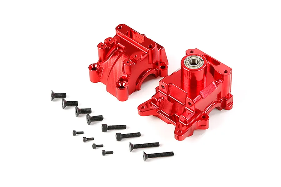 A pair of red anodized aluminium RC gearbox case halves with a set of various black metal screws on a white background.