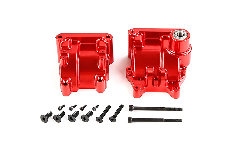 A red anodized aluminium gearbox case set for an RC car, including two main housing halves and a collection of black mounting screws on a white background.