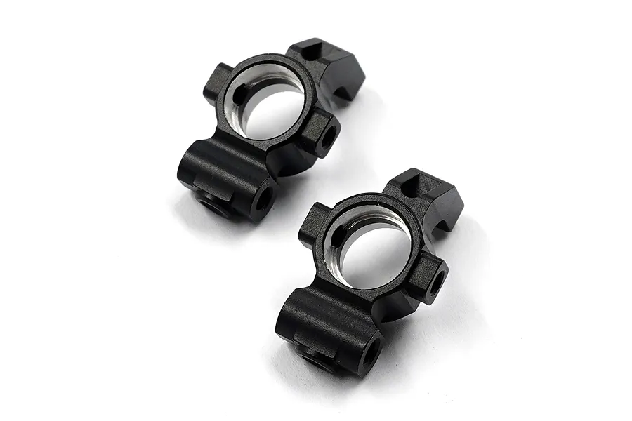 Two black anodized aluminium rear hub carriers for RC cars, shown from an angled top-down perspective on a white background.