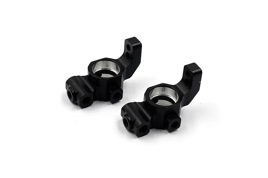 A pair of black anodized aluminium RC rear hubs from Yeah Racing, shown from an angled perspective against a white background.