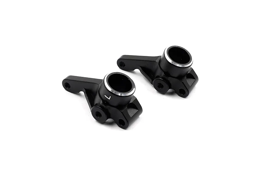 Two black anodized aluminium RC car steering knuckles with silver chamfered edges, one marked with an L.