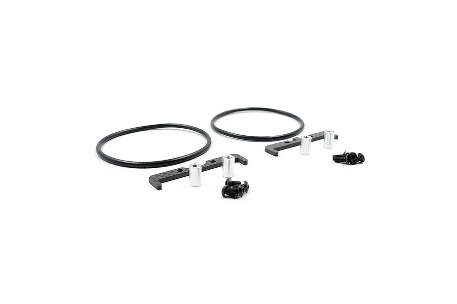 Yeah Racing carbon fibre battery holder set including two carbon plates, two rubber O-rings, four silver metal standoffs, and eight black screws.