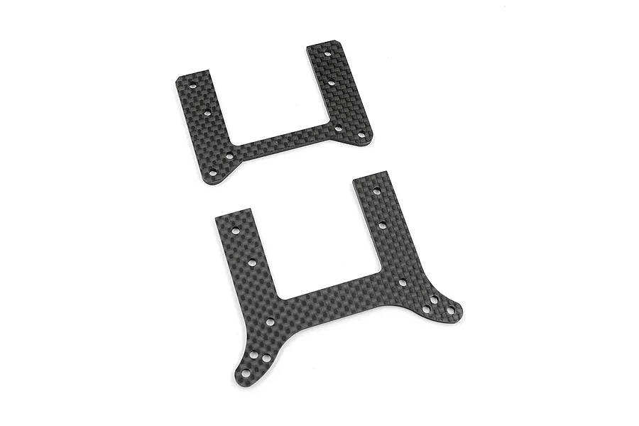 Two carbon fibre RC shock towers with a woven pattern and multiple mounting holes, isolated on a white background.