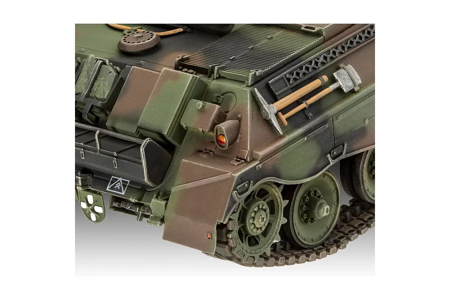 Close-up of a painted 1/35 scale model of a Raketenjagdpanzer Jaguar 1 tank, showing the rear hull, tracks, and mounted tools.