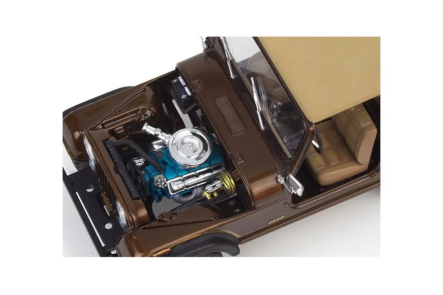 High-angle view of a brown 1/24 scale model Jeep CJ-7 with the hood open, revealing a detailed blue engine block and chrome air cleaner.