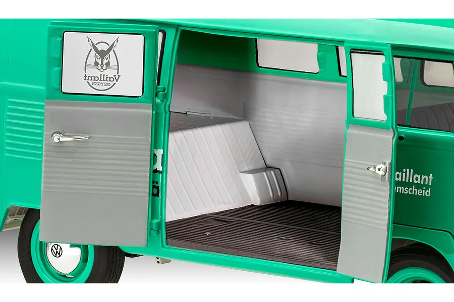Close-up of the open side doors of a green Revell VW T1 Bus model kit showing the grey interior cargo area and Vaillant branding.
