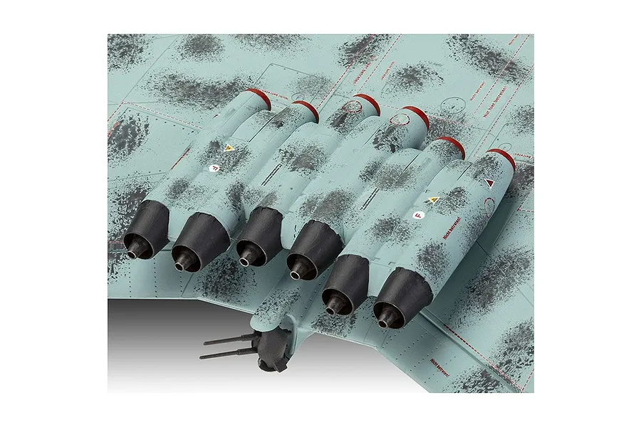 Close-up of the engine section on a scale model of an Arado Ar E.555 bomber, showing mottled camouflage paint and jet exhaust nozzles.