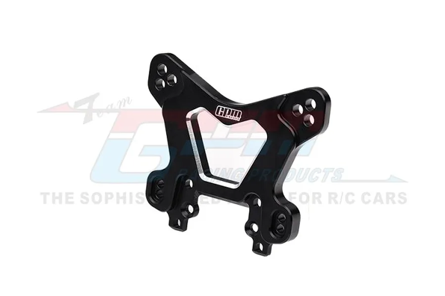 A black GPM Racing aluminium front shock tower for RC cars, featuring multiple mounting holes and a central cutout, shown against a white background.