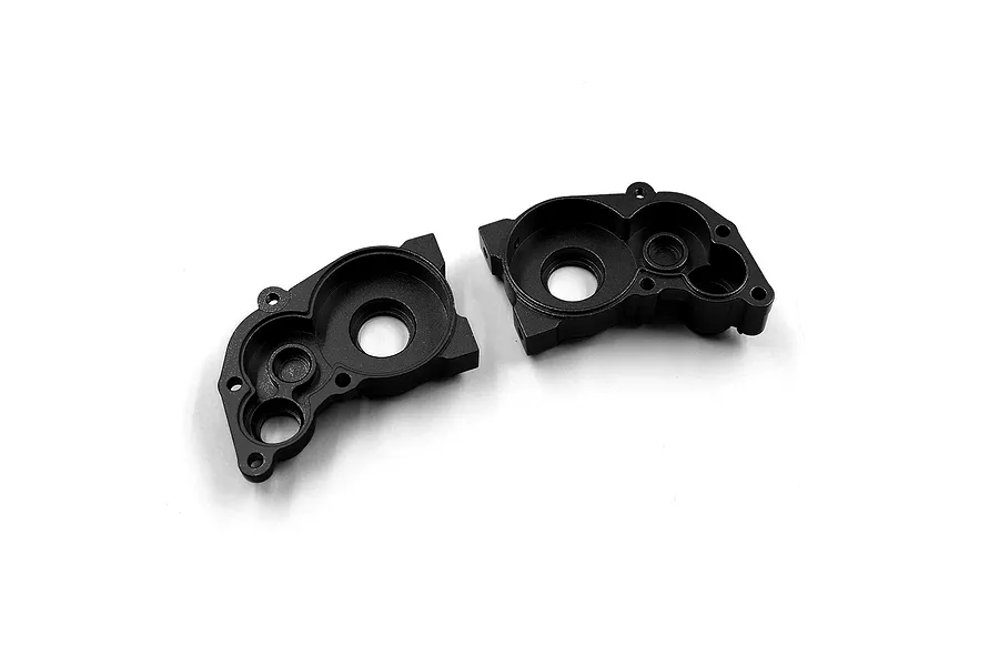 Two black anodized aluminium RC gearbox case halves shown from the interior side on a white background.