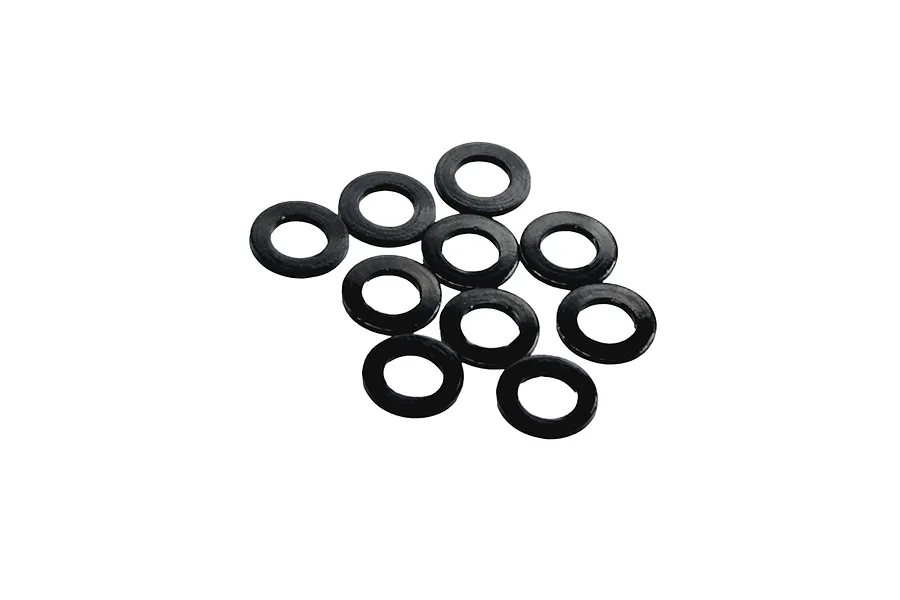 A cluster of ten small, thin, black circular shims or washers arranged on a white background.