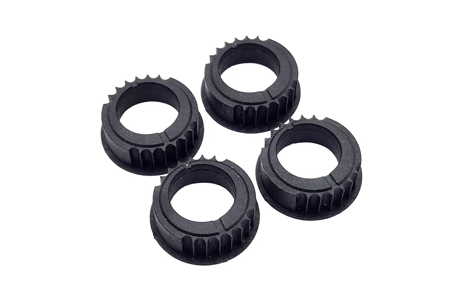 Four black plastic differential eccentric rings for RC cars arranged on a white background.
