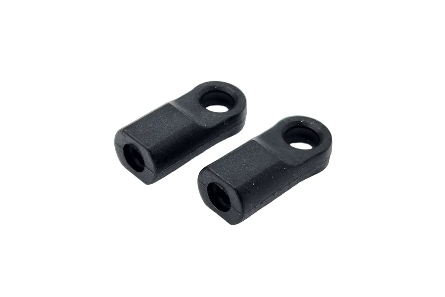 Two black RC Maker rear upper arm ball cups shown from an angled perspective against a white background.