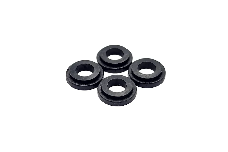 Four small black circular shock guides arranged in a cluster on a white background.
