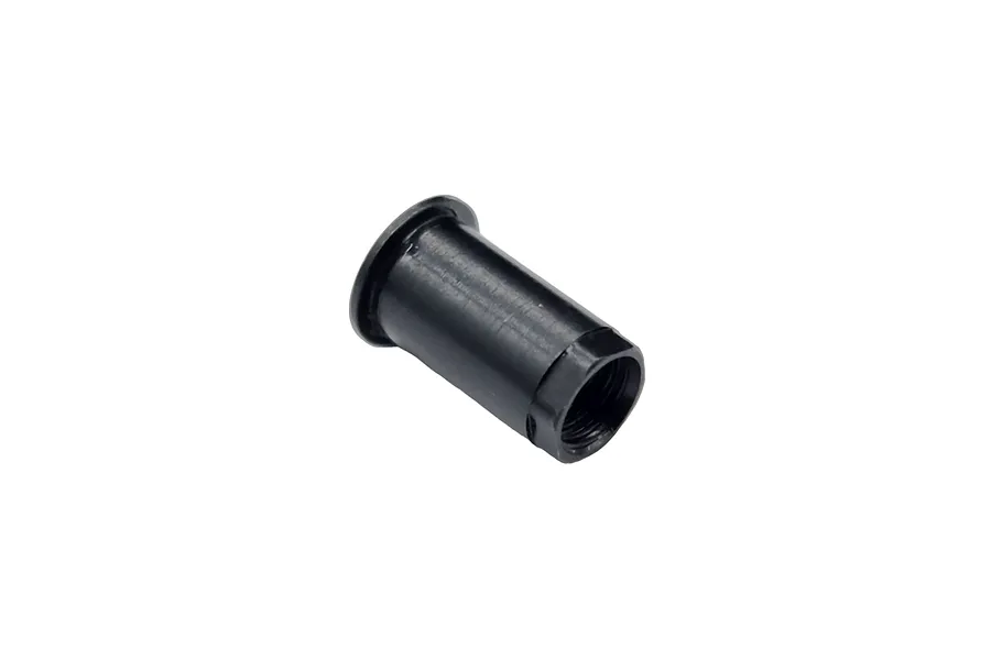 A black metal RC Maker centre tensioner sleeve with a flanged end and internal threading, isolated on a white background.