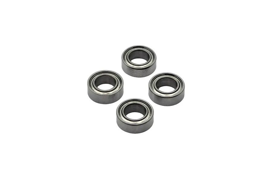 Four small metal shielded ball bearings arranged in a diamond pattern against a white background.