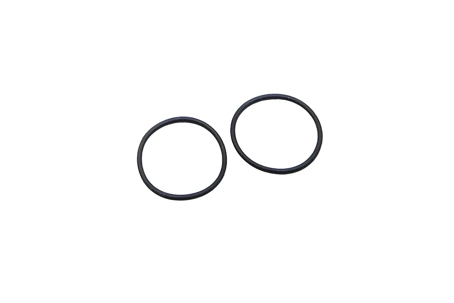 Two black circular rubber O-rings for RC shock collars, shown against a plain white background.