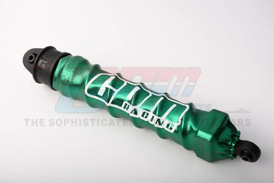 A green GPM Racing shock wrap installed on a black RC shock absorber, featuring a metallic finish and white logo branding.