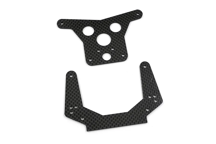 Two carbon fibre shock towers for an RC car, one triangular and one U-shaped, on a white background.