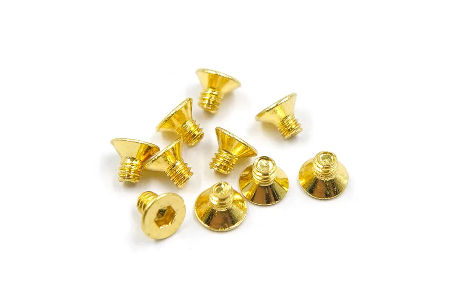 A small pile of gold-coloured countersunk RC screws with hexagonal drive heads on a white background.