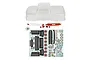 Clear polycarbonate RC truck body shell with separate plastic bumper parts, light buckets, and a large decal sheet on a white background.