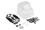 Clear polycarbonate Axial UMG10 RC truck cab body shell with black plastic parts trees, light buckets, and hardware on a white background.