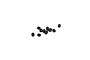 A collection of ten small black metal grub screws scattered on a white background.