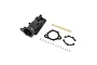 Pro Boat Jet Pump Housing Set including black plastic housing, brass shaft, gaskets, and various small metal screws and nuts on a white background.