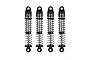 Four Pro-Line 1/24 scale Big Bore shock absorbers in black and silver, arranged vertically against a white background.