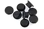 A group of eight small black rubber plugs for RC gear plates arranged on a white background.