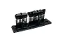 A set of black plastic RC car side mirrors on a sprue, featuring a rounded, aerodynamic design.