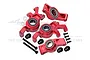 A set of red anodized aluminium front steering hubs and rear hubs for an RC car, including bearings, screws, and small black plastic spacers.