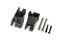 Two grey plastic rear axle carriers and four metal mounting screws for a Traxxas RC vehicle.