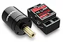 Traxxas brushless outrunner motor with a brass pinion gear next to a Traxxas ECM electronic control module on a white background.