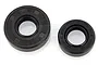 Two black rubber oil seals of different sizes for RC engines, shown against a white background.