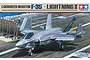 Box art for Tamiya 1/48 scale Lockheed Martin F-35C Lightning II plastic model kit showing the aircraft on an aircraft carrier deck.