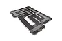 A high-angle studio shot of a Kyosho Mini-Z modular race track layout featuring black and grey tiles with white border barriers.