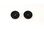 Two black circular RC shock pistons with five small holes each, viewed from above on a white background.