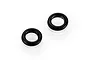 Two small black rubber O-rings for RC car differential outdrives, isolated on a white background.