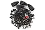 A large assortment of black RC hardware including screws, bolts, nuts, washers, clips, and three black rubber boots on a white background.