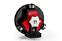 Raceform 1/10 scale wheel arch cutter tool featuring a black circular base, red central plate, and white adjustment knob on a white background.