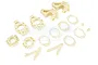 A set of white nylon RC car front and rear hub components including steering knuckles, bearing carriers, and suspension arms on a white background.
