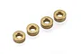 Four small brass-coloured Oilite bushings arranged in a diagonal line against a white background.