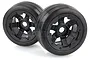 Two black Rovan 1/5 scale RC buggy rear slick tires mounted on black beadlock rims against a white background.
