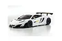 A white Kyosho Mini-Z McLaren 12C GT3 RC car on a white background, featuring black wheels, a rear wing, and racing decals.