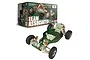 Team Associated RC10 Classic 40th Anniversary Edition 2WD RC buggy kit chassis with its green packaging box in the background.