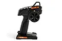 Side profile of a black HPI Racing TF-50 2.4GHz 3-channel RC transmitter with orange accents on a white background.