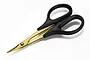 A pair of GPM Racing curved scissors with gold-coloured blades and black plastic handles on a white background.