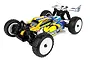 Team Associated Reflex 14B RC buggy with a yellow, blue, and white flame-patterned body, white wheels, and black off-road tires on a white background.